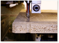 device during milling of a furniture construction part 